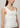 Stellar Studio White Top with a sleek, slim fit, double-layered jersey, top-stitch details, and a neoprene-like feel for chic versatility.