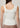 Stellar Studio White Top with a sleek, slim fit, double-layered jersey, top-stitch details, and a neoprene-like feel for chic versatility.